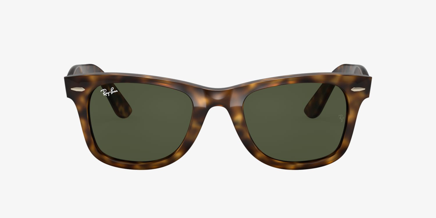 Coach Brown with blue arms Wayfarer Glasses. Currently has prescription lenses. Coach HC6238U Eyeglasses | LensCrafters main image 4